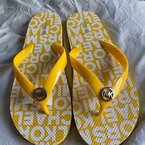New, Never Used Yellow Michael Kors Flip Flops!